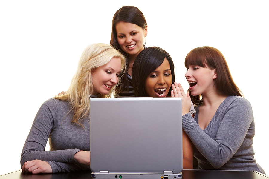 bigstock_Women_Chatting_With_A_Laptop_8017469
